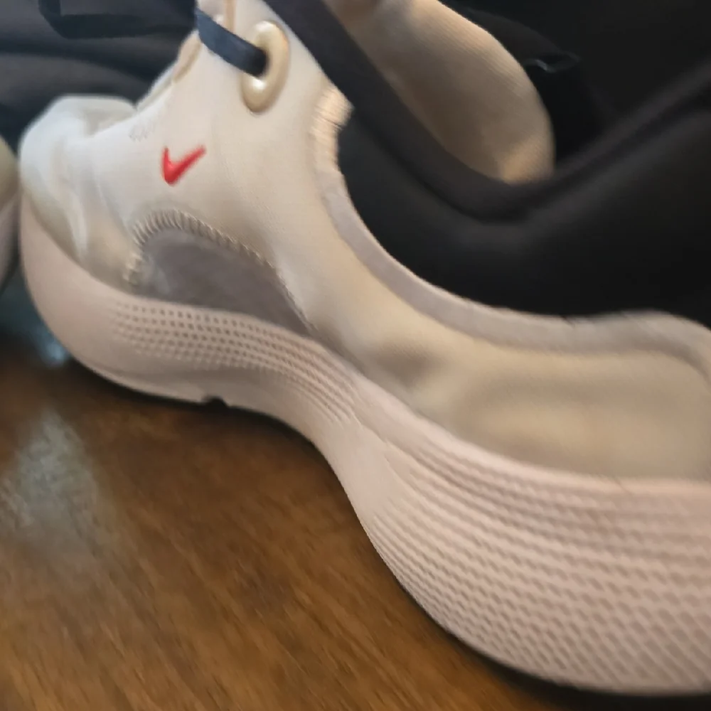 Nike White and Black Running Shoes with Gold Swoosh - Picture 12 of 13
